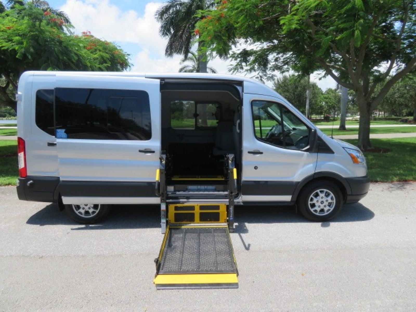 2015 Silver Ford Transit 350 Wagon Low Roof XL 60/40 Pass. 148-in. WB (1FBAX2CM3FK) with an 3.7L V6 DOHC 24V engine, 6-Speed Automatic transmission, located at 4301 Oak Circle #19, Boca Raton, FL, 33431, (954) 561-2499, 26.388861, -80.084038 - You are looking at a Beautiful 2015 Ford Transit T350 XLT Medium Handicap Wheelchair Conversion van with 20K Original Miles, Braunability Millennium 800lb Wheelchair Lift, Hand Controls, B&D 6 Way Transfer Seat, EZ Lock System, Dual A/C, Alloy Wheels, 7 Rear Seats Plus the Driver and Passenger Seat, - Photo #2