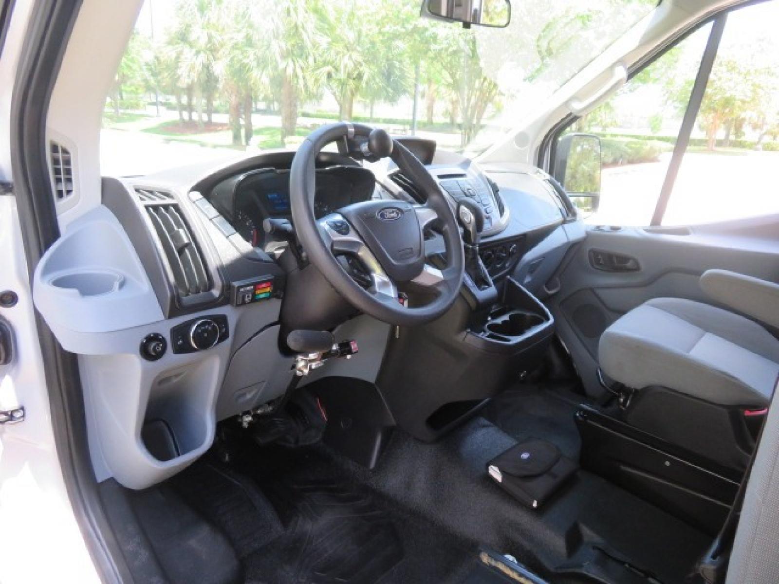 2015 Silver Ford Transit 350 Wagon Low Roof XL 60/40 Pass. 148-in. WB (1FBAX2CM3FK) with an 3.7L V6 DOHC 24V engine, 6-Speed Automatic transmission, located at 4301 Oak Circle #19, Boca Raton, FL, 33431, (954) 561-2499, 26.388861, -80.084038 - You are looking at a Beautiful 2015 Ford Transit T350 XLT Medium Handicap Wheelchair Conversion van with 20K Original Miles, Braunability Millennium 800lb Wheelchair Lift, Hand Controls, B&D 6 Way Transfer Seat, EZ Lock System, Dual A/C, Alloy Wheels, 7 Rear Seats Plus the Driver and Passenger Seat, - Photo #73