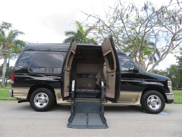 photo of 2013 Ford E-Series Van E-150 Handicap Wheelchair Conversion Van Transfer Seat Hand Controls Power Doors