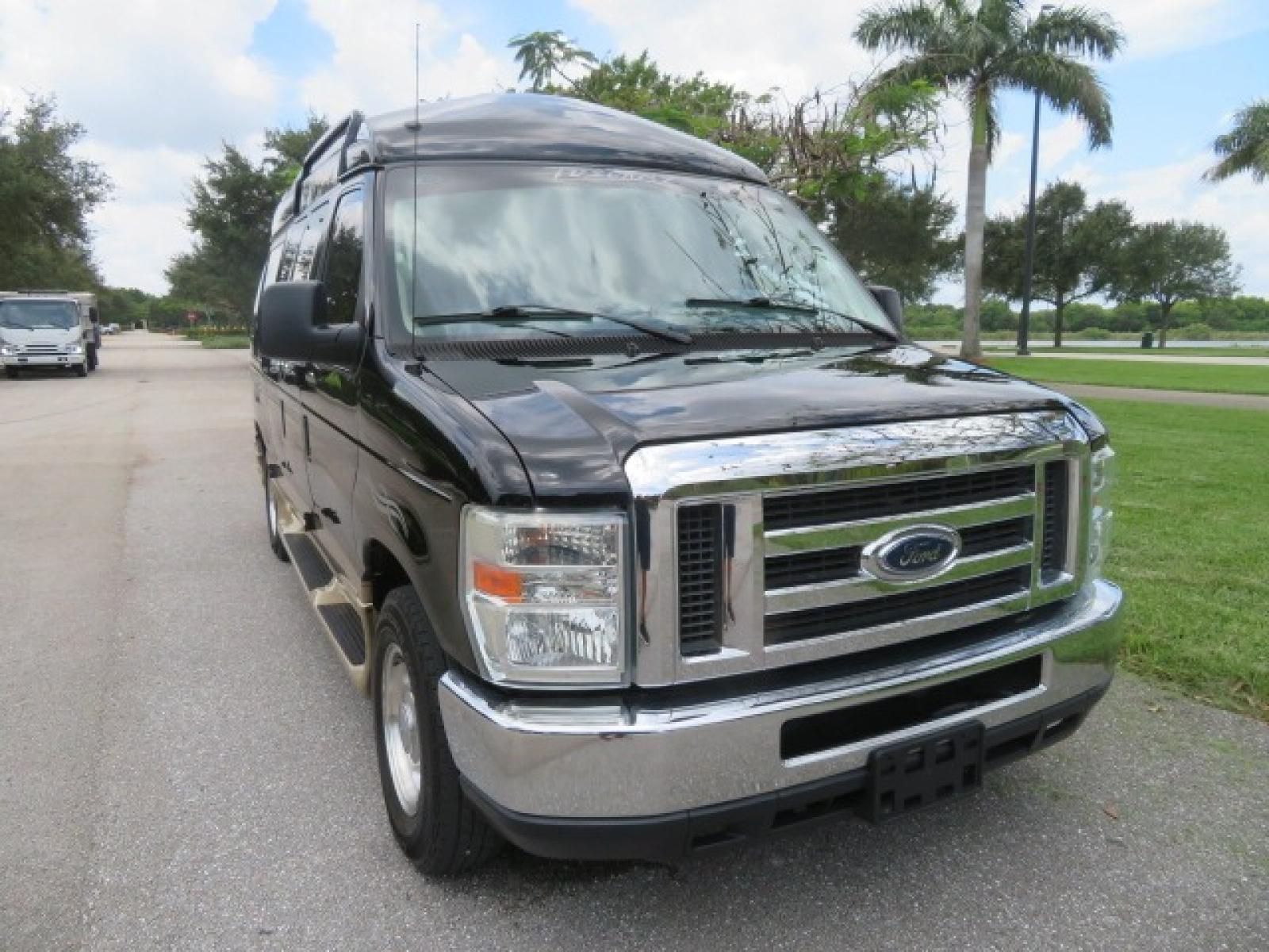 2013 Black Ford E-Series Van E-150 (1FDNE1EL6DD) with an 5.4L V8 SOHC 16V FFV engine, 4-Speed Automatic transmission, located at 4301 Oak Circle #19, Boca Raton, FL, 33431, (954) 561-2499, 26.388861, -80.084038 - You are looking at a Beautiful 2013 Ford Econoline Handicap Wheelchair Conversion Van Tuscany VMI Conversion with 76K Original Miles, Ricon Side Entry Wheelchair Lift (the lift is almost brand new), Raised Side Entry Doors, Power Side Entry Doors, 6 Way Transfer Seat, Hand Controls Factory Navigatio - Photo #11
