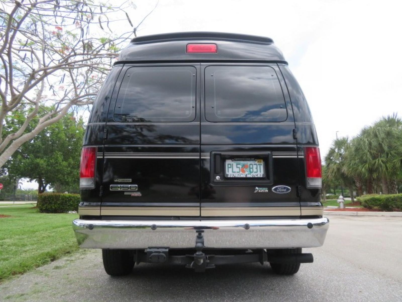 2013 Black Ford E-Series Van E-150 (1FDNE1EL6DD) with an 5.4L V8 SOHC 16V FFV engine, 4-Speed Automatic transmission, located at 4301 Oak Circle #19, Boca Raton, FL, 33431, (954) 561-2499, 26.388861, -80.084038 - Photo #18