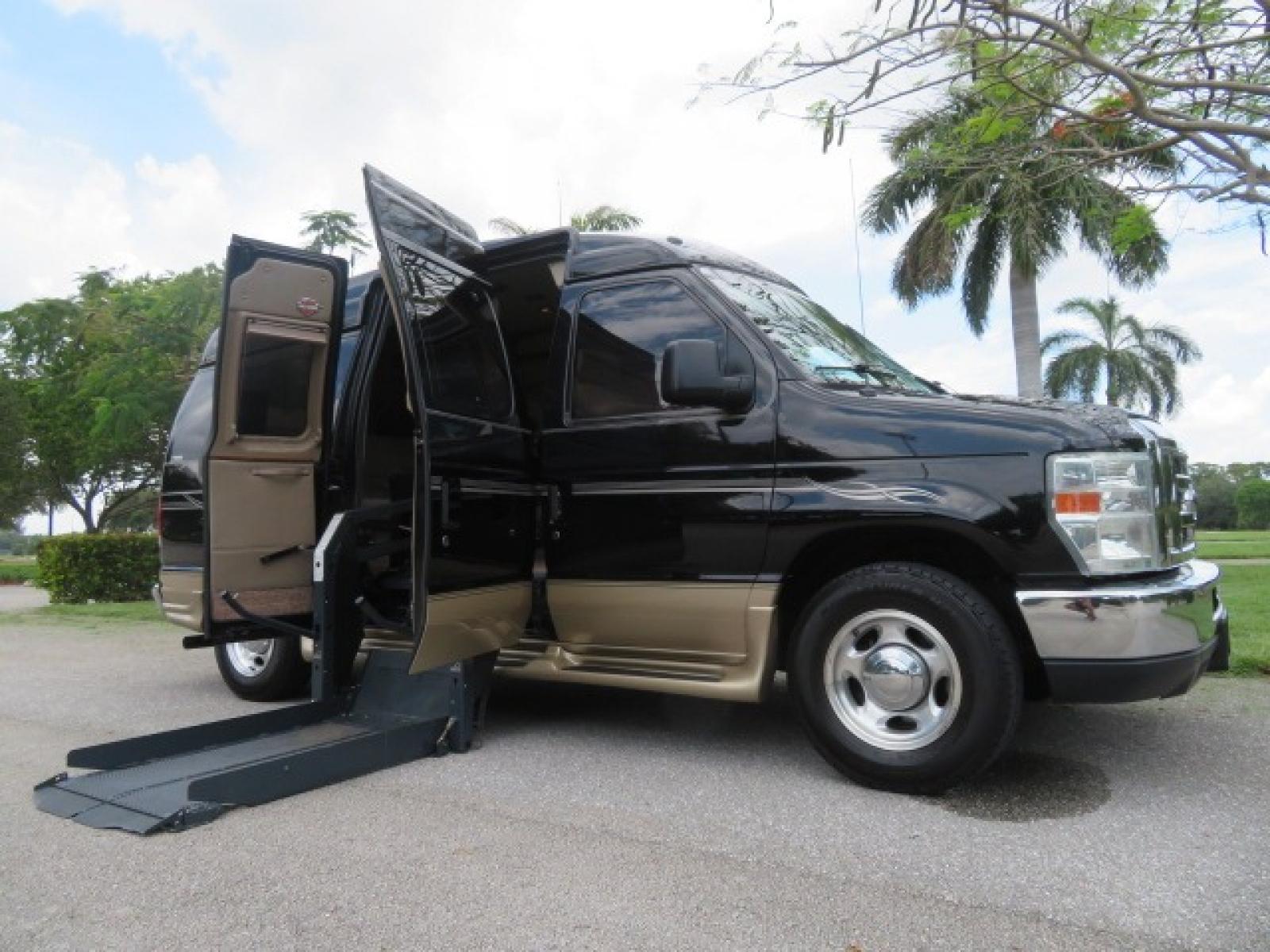 2013 Black Ford E-Series Van E-150 (1FDNE1EL6DD) with an 5.4L V8 SOHC 16V FFV engine, 4-Speed Automatic transmission, located at 4301 Oak Circle #19, Boca Raton, FL, 33431, (954) 561-2499, 26.388861, -80.084038 - You are looking at a Beautiful 2013 Ford Econoline Handicap Wheelchair Conversion Van Tuscany VMI Conversion with 76K Original Miles, Ricon Side Entry Wheelchair Lift (the lift is almost brand new), Raised Side Entry Doors, Power Side Entry Doors, 6 Way Transfer Seat, Hand Controls Factory Navigatio - Photo #2