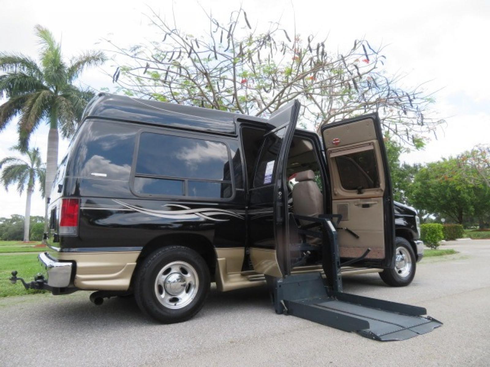 2013 Black Ford E-Series Van E-150 (1FDNE1EL6DD) with an 5.4L V8 SOHC 16V FFV engine, 4-Speed Automatic transmission, located at 4301 Oak Circle #19, Boca Raton, FL, 33431, (954) 561-2499, 26.388861, -80.084038 - You are looking at a Beautiful 2013 Ford Econoline Handicap Wheelchair Conversion Van Tuscany VMI Conversion with 76K Original Miles, Ricon Side Entry Wheelchair Lift (the lift is almost brand new), Raised Side Entry Doors, Power Side Entry Doors, 6 Way Transfer Seat, Hand Controls Factory Navigatio - Photo #3