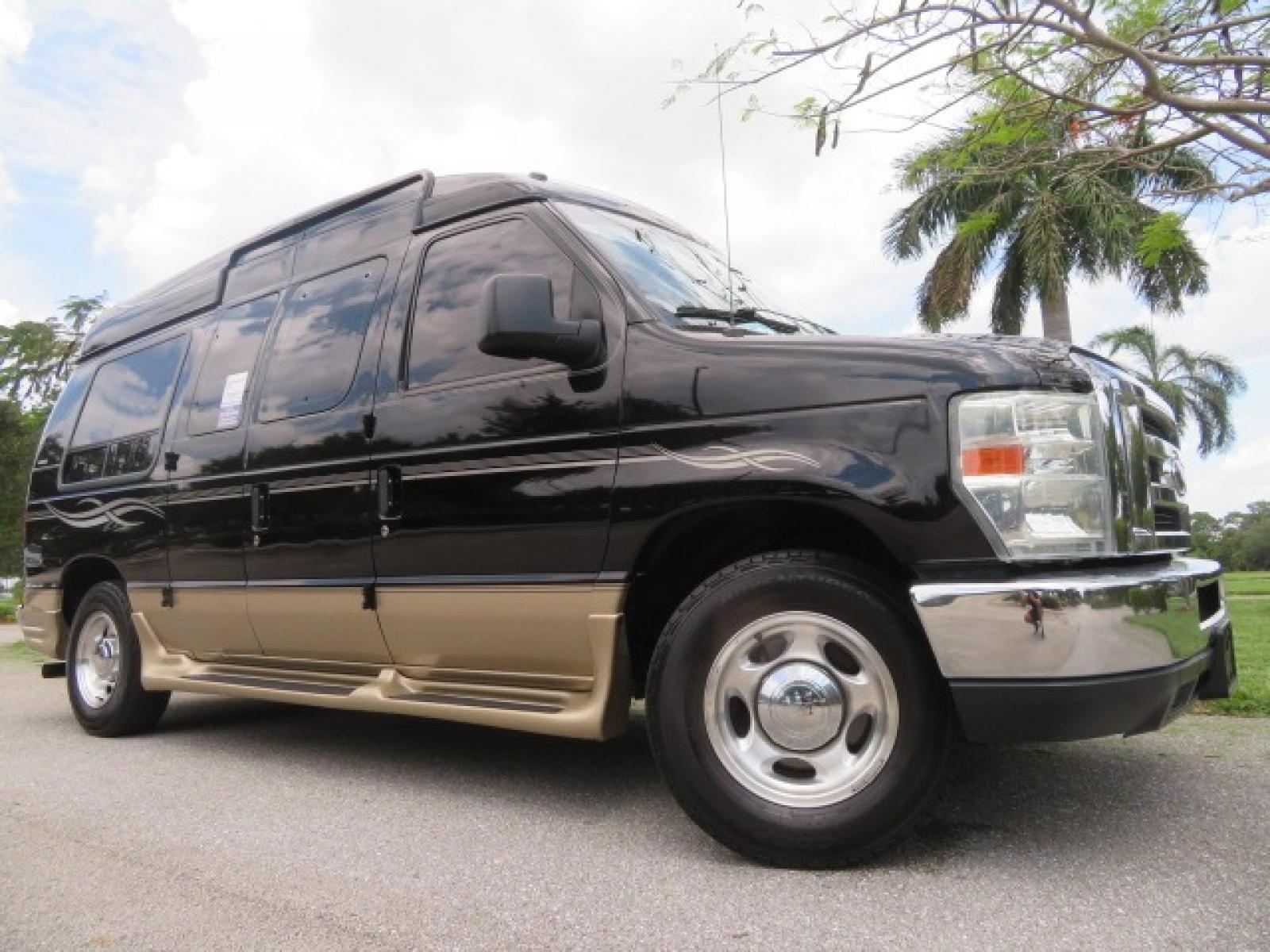 2013 Black Ford E-Series Van E-150 (1FDNE1EL6DD) with an 5.4L V8 SOHC 16V FFV engine, 4-Speed Automatic transmission, located at 4301 Oak Circle #19, Boca Raton, FL, 33431, (954) 561-2499, 26.388861, -80.084038 - You are looking at a Beautiful 2013 Ford Econoline Handicap Wheelchair Conversion Van Tuscany VMI Conversion with 76K Original Miles, Ricon Side Entry Wheelchair Lift (the lift is almost brand new), Raised Side Entry Doors, Power Side Entry Doors, 6 Way Transfer Seat, Hand Controls Factory Navigatio - Photo #4