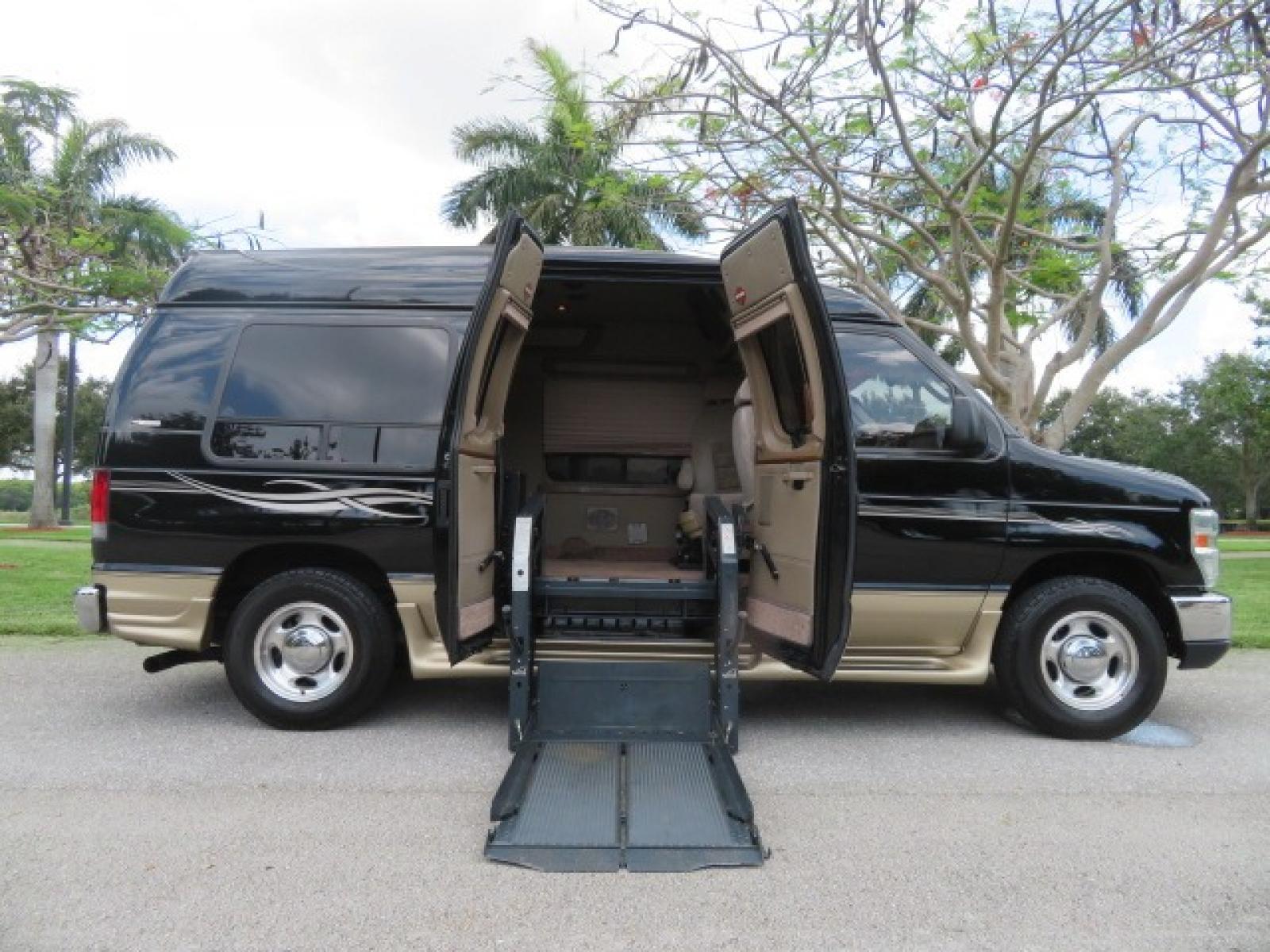 2013 Black Ford E-Series Van E-150 (1FDNE1EL6DD) with an 5.4L V8 SOHC 16V FFV engine, 4-Speed Automatic transmission, located at 4301 Oak Circle #19, Boca Raton, FL, 33431, (954) 561-2499, 26.388861, -80.084038 - You are looking at a Beautiful 2013 Ford Econoline Handicap Wheelchair Conversion Van Tuscany VMI Conversion with 76K Original Miles, Ricon Side Entry Wheelchair Lift (the lift is almost brand new), Raised Side Entry Doors, Power Side Entry Doors, 6 Way Transfer Seat, Hand Controls Factory Navigatio - Photo #47