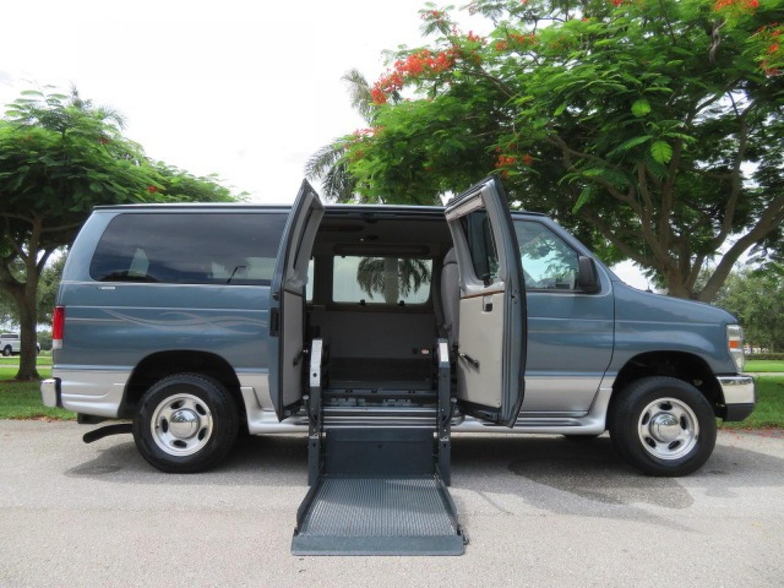 2012 Dark Blue Ford E-Series Van E-150 (1FTNE1EL9CD) with an 5.4L V8 SOHC 16V FFV engine, 4-Speed Automatic transmission, located at 4301 Oak Circle #19, Boca Raton, FL, 33431, (954) 561-2499, 26.388861, -80.084038 - You are looking at a Beautiful 2012 Ford Econoline Handicap Wheelchair Conversion Van Tuscany VMI with Lowered Floor, Power Side Entry Doors, 800LB Side Entry Wheelchair Lift, B and D 6 Way Transfer Seat, Fully Wireless Door and Wheelchair lift System with 3 Remote Controls, Hand Controls, Tie Down - Photo #1