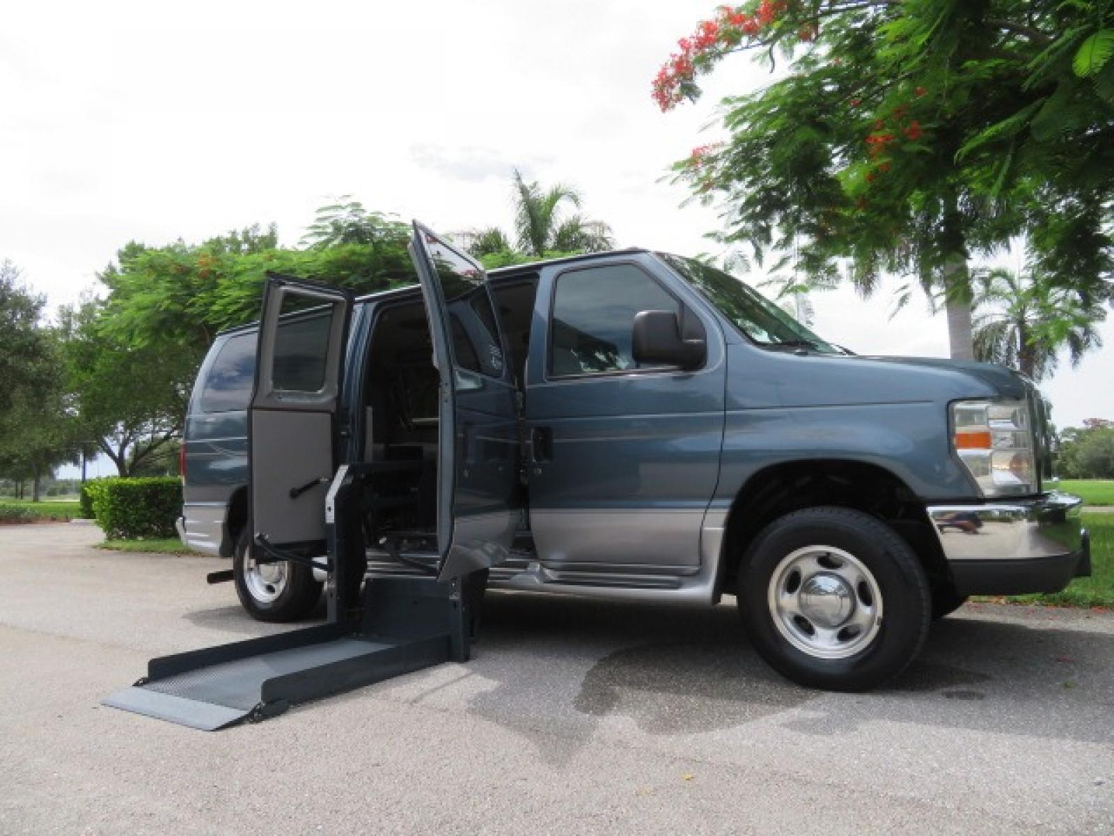 2012 Dark Blue Ford E-Series Van E-150 (1FTNE1EL9CD) with an 5.4L V8 SOHC 16V FFV engine, 4-Speed Automatic transmission, located at 4301 Oak Circle #19, Boca Raton, FL, 33431, (954) 561-2499, 26.388861, -80.084038 - You are looking at a Beautiful 2012 Ford Econoline Handicap Wheelchair Conversion Van Tuscany VMI with Lowered Floor, Power Side Entry Doors, 800LB Side Entry Wheelchair Lift, B and D 6 Way Transfer Seat, Fully Wireless Door and Wheelchair lift System with 3 Remote Controls, Hand Controls, Tie Down - Photo #2